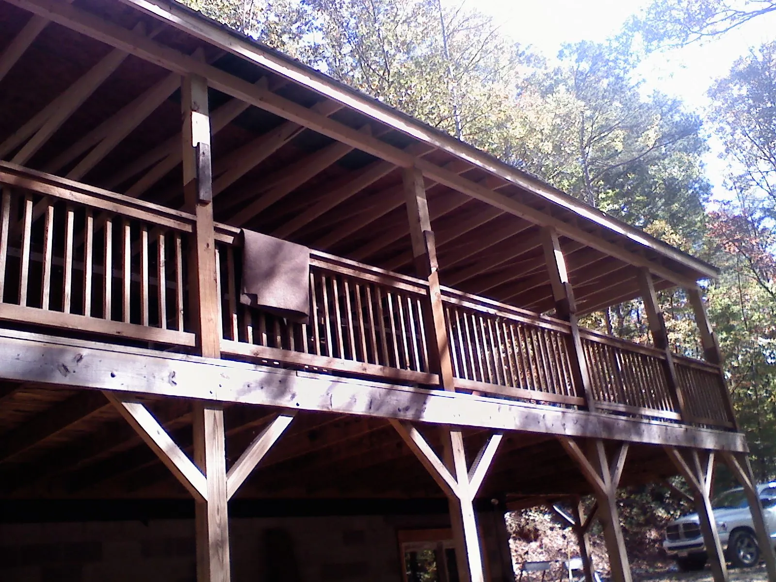 Timber framing under a new elevated porch and deck — Roof Leak Repair in Freeville by Roofing Brothers